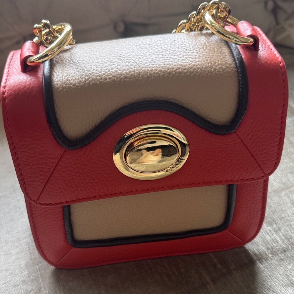 Bodhi Mini Bag in burnt orange Cream with Gold Accents
One of a kind‎ !!!